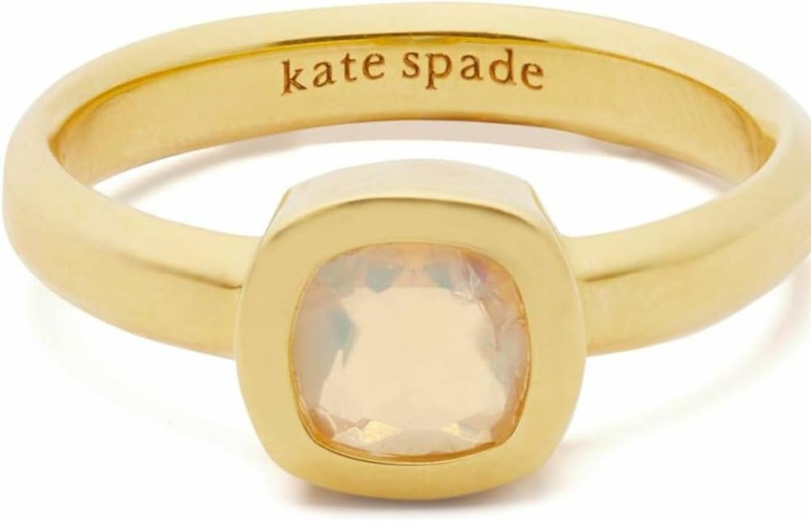 Kate Spade New York Shimmering Gemstone Ring - Elegant Gold-Tone Jewelry with Sparkling Crystals